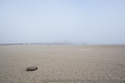 Stearns Wharf on a foggy day seen from West Beach.jpg