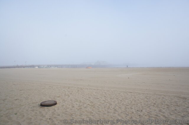 Stearns Wharf on a foggy day seen from West Beach.jpg