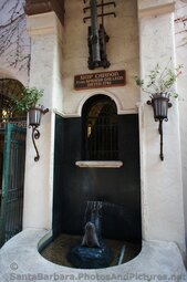 Ship Cannon from 1741 Spanish Galleon above fountain at La Arcada Santa Barbara.jpg